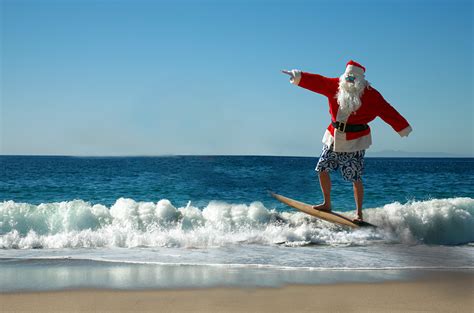 Hundreds of Santas surf on Florida’s Space Coast on Christmas Eve