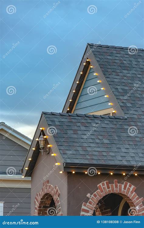 Outdoor Christmas Lights on the Roof of a Home Stock Photo - Image of ...