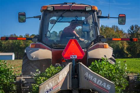 Farmer in Tractor on Field · Free Stock Photo