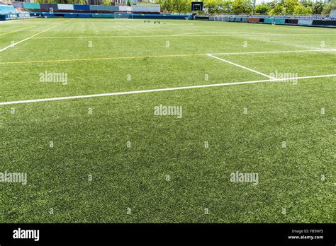 Empty football field with green grass Stock Photo - Alamy