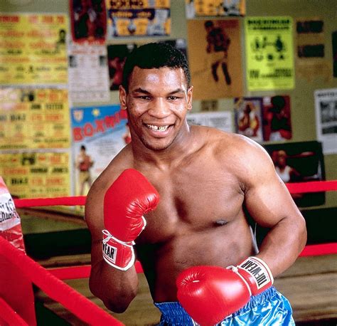 Mike Tyson and Evander Holyfield were separated in violent sparring session and had tense stand ...