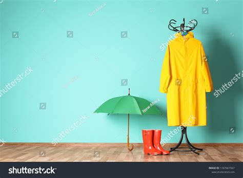 Umbrella Rain Coat Boots Near Color Stock Photo 1167667567 | Shutterstock