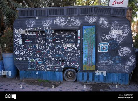 A parked and artictically graffitied hippie van Stock Photo - Alamy