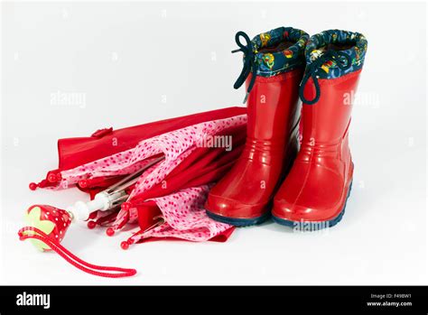 Umbrella and boots for the rain Stock Photo - Alamy