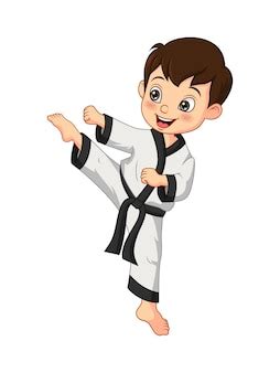 Premium Vector | Cartoon little boy practicing karate
