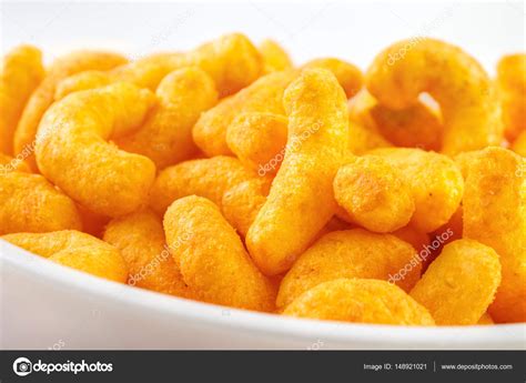 Cheese puff snacks Stock Photo by ©arskajuhani 148921021