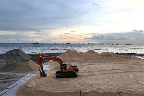 ‘White sand not remedy to Manila Bay pollution’ | Philstar.com