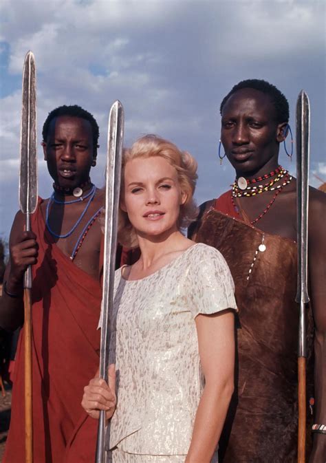 Carroll Baker with Maasai tribes people, while on location at Lake Naivasha and Amboseli ...