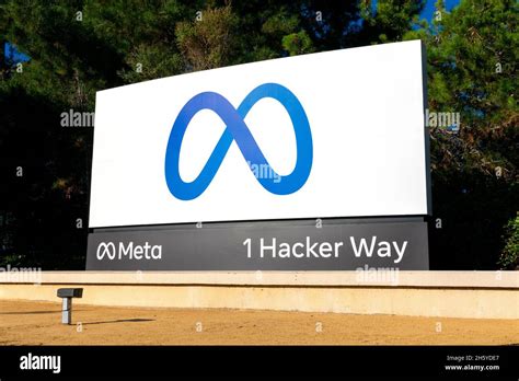 Meta logo, sign near Meta Platforms headquarters on 1 Hacker Way. Facebook changed name to Meta ...