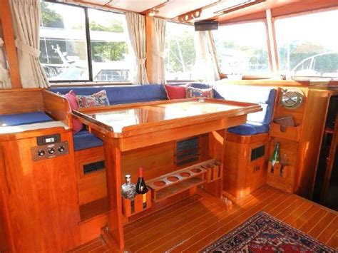 Salon of a smaller trawler. Great brightwork. | Boat interior, Wooden boats, Boat decor