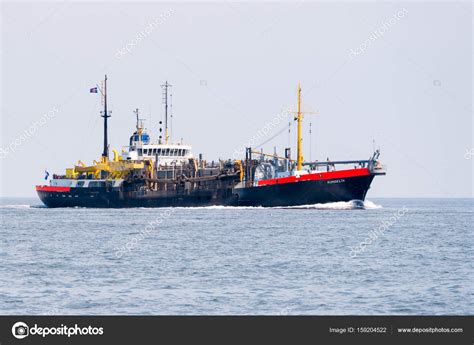 Trailing suction hopper dredger ship unloading at North Sea near – Stock Editorial Photo ...