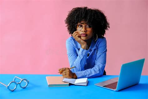 Pensive Young Businesswoman Leaning on Hand while Working with Laptop Computer Stock Image ...