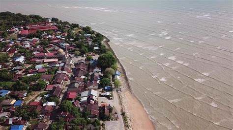 Kuala Muda town and wave heading to the town at Kuala Muda, Penang ...