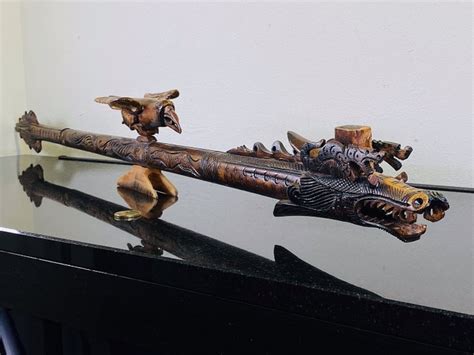 Beautiful Dragon blowpipe with bird of bone with arrows - - Catawiki