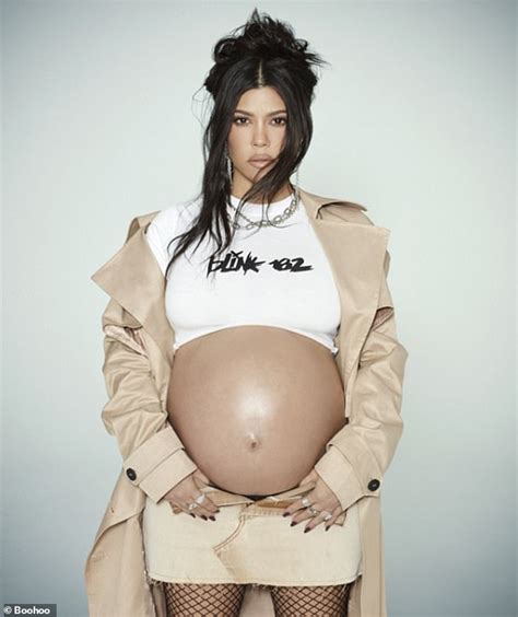 Pregnant Kourtney Kardashian shows off her baby bump in a Blink-182 ...