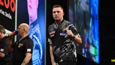 Premier League Darts: Debutant Chris Dobey stuns Michael van Gerwen to ...