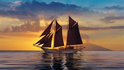 Sail aboard a Traditional Phinisi Boat into Indonesia s Ring of Fire #posh Komodo National Park ...