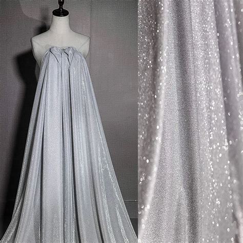 Premium-White-W-Silver-Glitter-Sparkle-Stretch-Tulle-Fabric-Sold-by-the-Meter.jpg