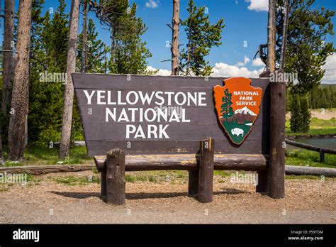 The Yellowstone National Park south entrance sign, Wyoming, USA Stock Photo - Alamy