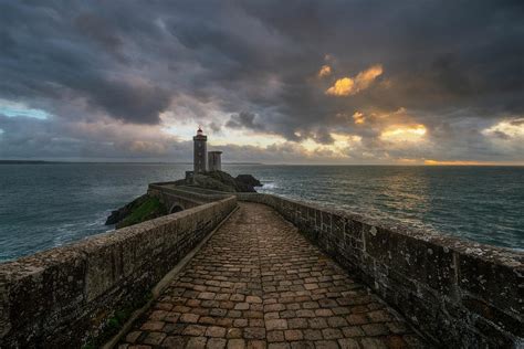 Light On The Petit Minou Lighthouse Photograph by Mathieu Rivrin - Pixels