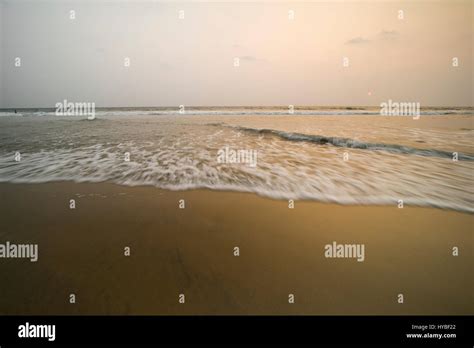 Varkala beach sunset Stock Photo - Alamy