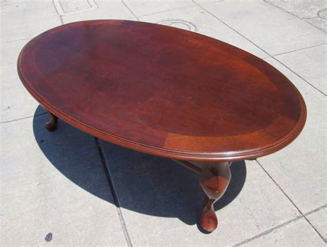 UHURU FURNITURE & COLLECTIBLES: SOLD Oval Wood Coffee Table - $40