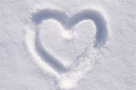 Premium Photo | Heart shape on the snow