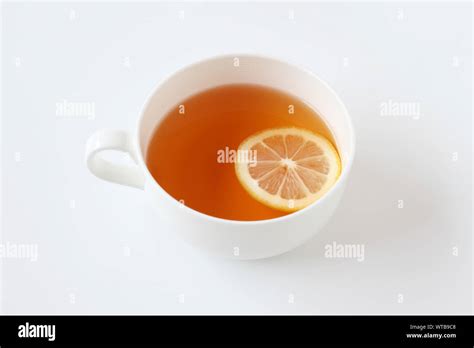 cup of tea with sliced lemon closeup isolated on white background Stock Photo - Alamy