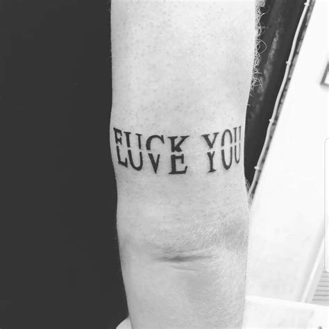 FUCKYOU LOVEYOU script on @mitchlittle_ by our artist @tattoomurdok ...