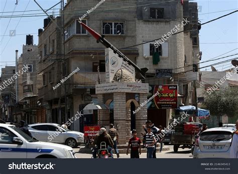 Palestinians Walk Past Model R160 Rocket Stock Photo 2146345413 | Shutterstock