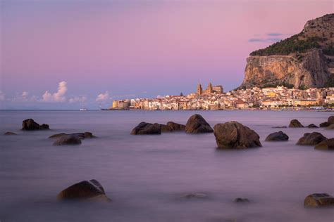 Sunset at Cefalu beach 1266616 Stock Photo at Vecteezy