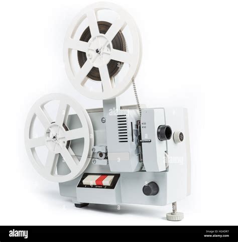 Old film projector isolated on a white background Stock Photo - Alamy