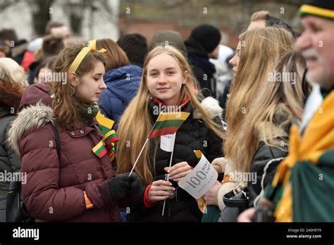 Vilnius, Lithuania - February 16: unidentified people gathered with flags in a natonal ...