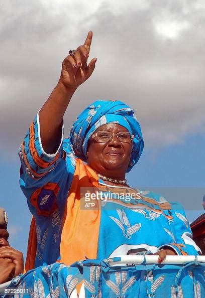 President Bingu wa Mutharika's runningmate Joyce Banda raises her... News Photo - Getty Images