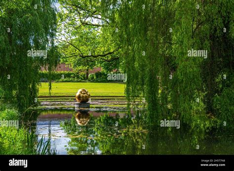 Object of art in the water, Glacis Park in Neu-Ulm, Bavaria, Germany Stock Photo - Alamy
