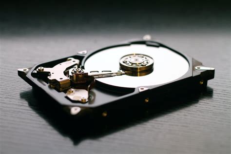 Black Internal Hdd on Black Surface · Free Stock Photo