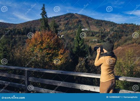 Beautiful Woman Photographs Nature on the Mountain in Autumn Stock Image - Image of journalist ...