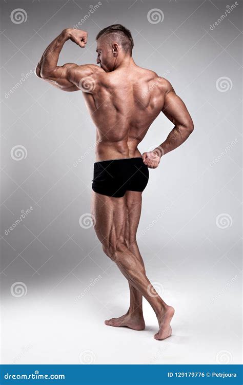 Strong Athletic Man Fitness Model Posing Back Muscles Stock Photo ...