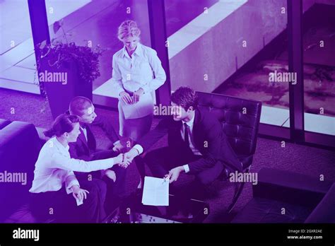 business people shaking hands make deal and sign contract Stock Photo - Alamy