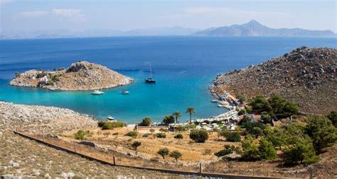 Agia Marina beach, an oasis with crystal clear waters in Symi island | GooGreece