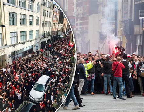 Arsenal Cologne: Huge crowd of FC Koln fans light flares on Oxford ...