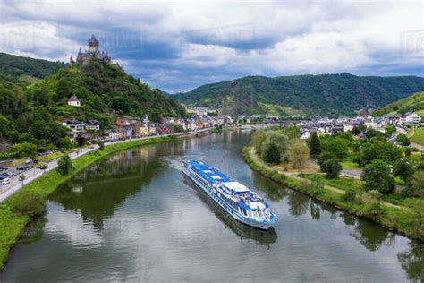 River cruise ship on the Moselle in Cochem, Moselle valley, Rhineland-Palatinate, Germany ...