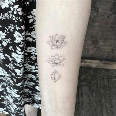 Blooming lotus flower tattoo on the left inner forearm. | Small lotus tattoo, Lotus tattoo ...