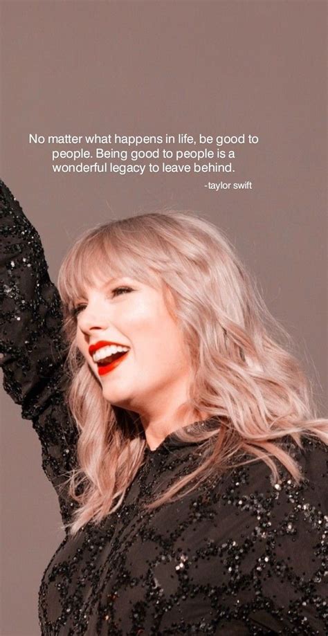 a woman with long blonde hair and red lipstick holding her hand up in ...