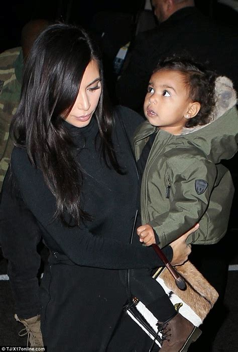 Photos: Kanye West & daughter step out in matching fight jackets ...