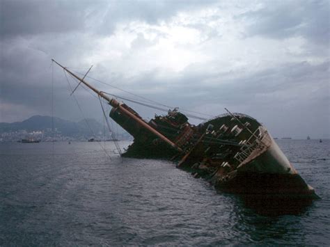 The sad wreck of RMS Queen Elizabeth - Hong Kong Harbor - The Vintage News