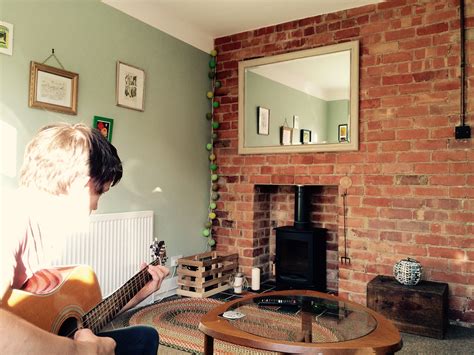 Front room. Bare brick. Charnwood Stove. Large Over-Mantel Mirror. Sage ...