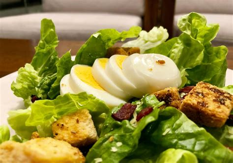 Free stock photo of Caesar salad, close-up view, eating