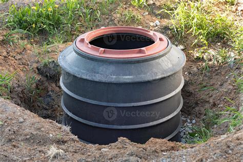 Installation of underground tank for sewage system 15743275 Stock Photo at Vecteezy