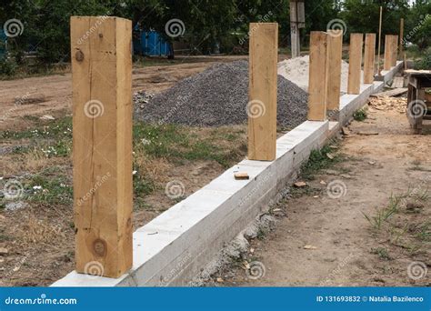 Concrete Foundation for Fence. Stock Photo - Image of retaining, material: 131693832